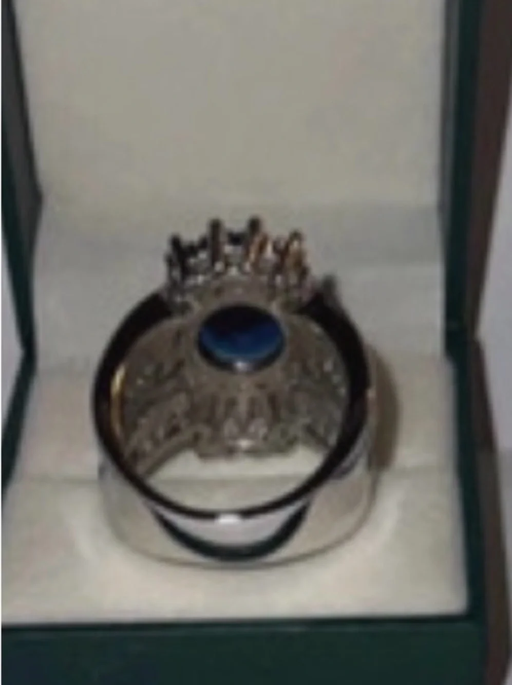 Elegant Silver Cocktail Ring with Deep Blue Center Stone